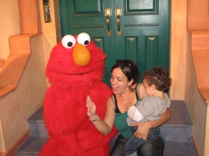 Giving Elmo a "High Five"