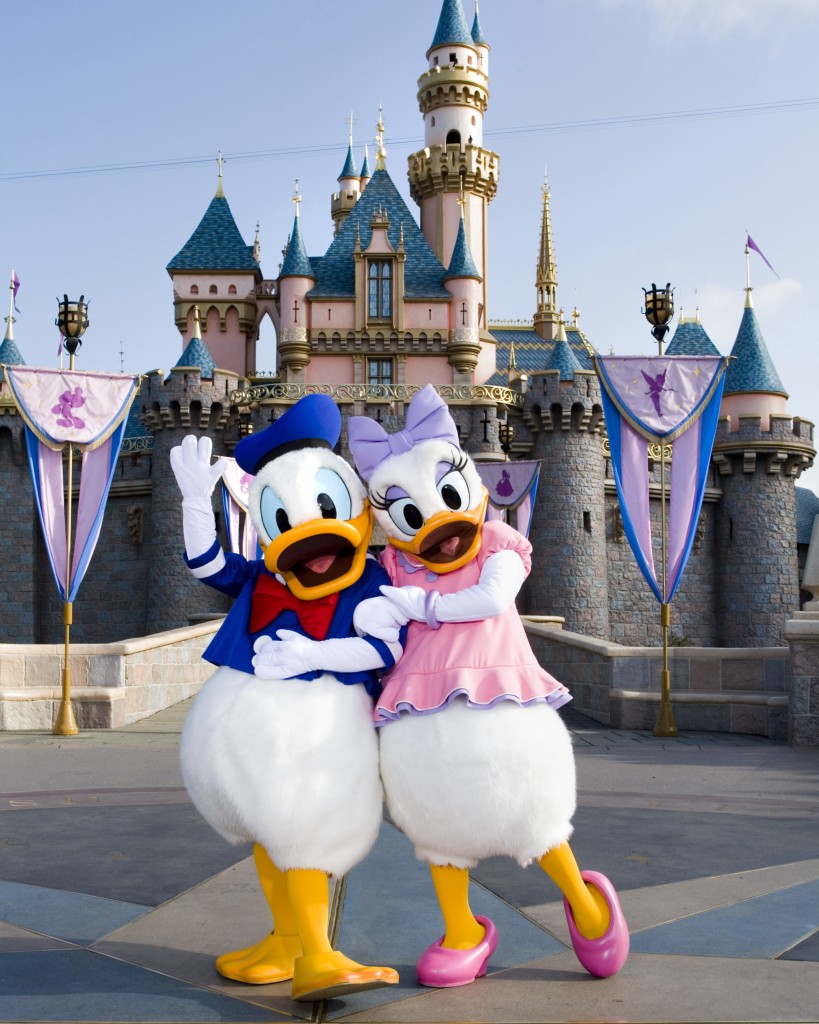 Donald Duck & Daisy in front of Sleeping Beauty Castle