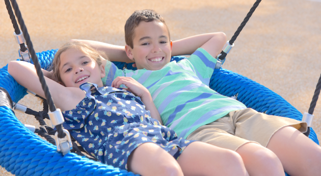 Siblings on Swing